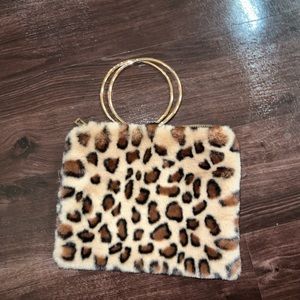 Cheetah print clutch with gold handles